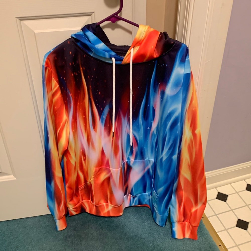 Pullover hoodie.  Never worn. Pet free and smoke free home. Soft silky material.